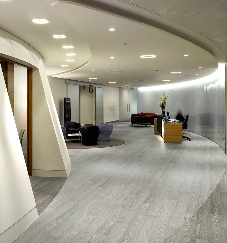 Polyflor Forest FX wood-effect sheet vinyl in a commercial lounge