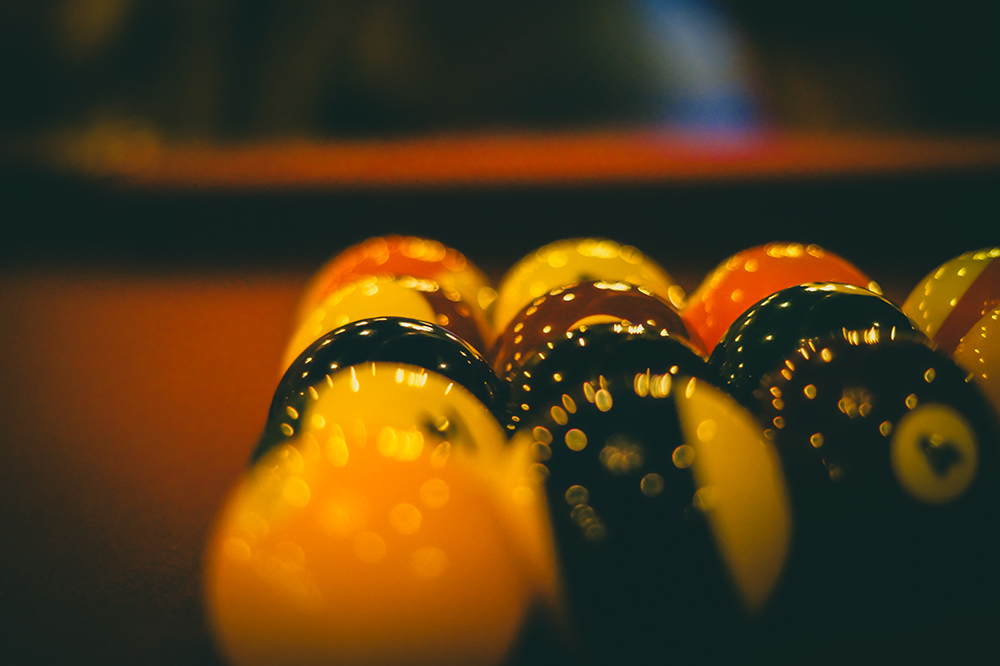 Triangle racked pool balls