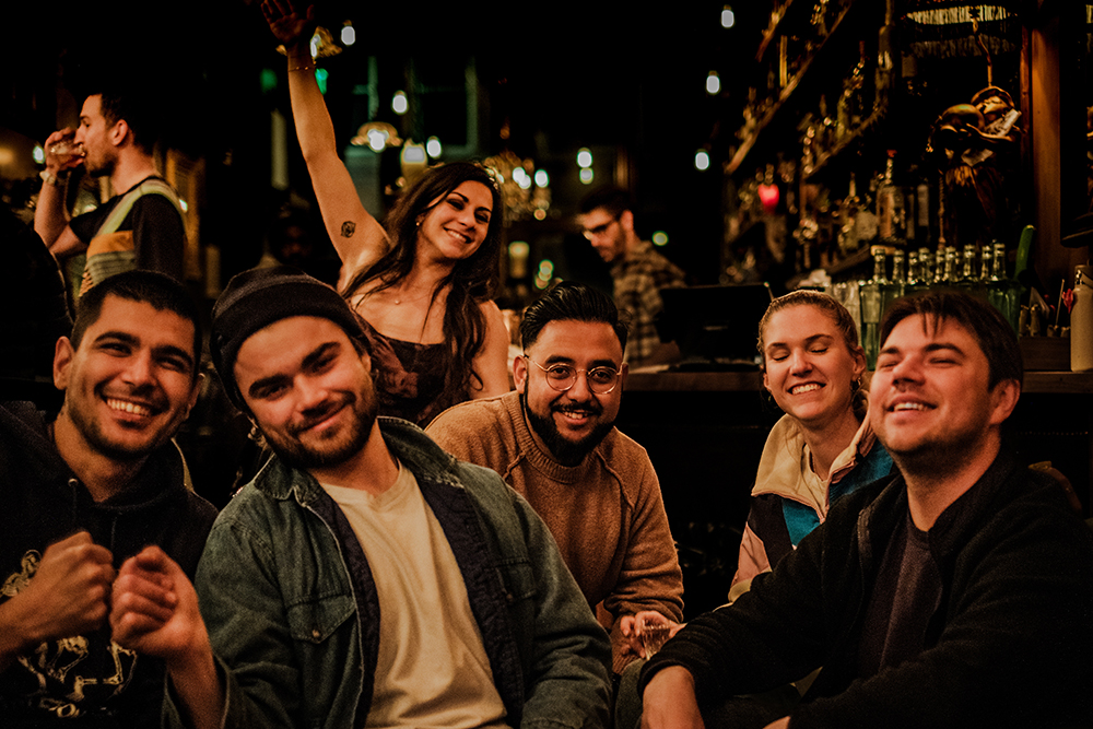 A number of regular patrons gathered at stools around the bar