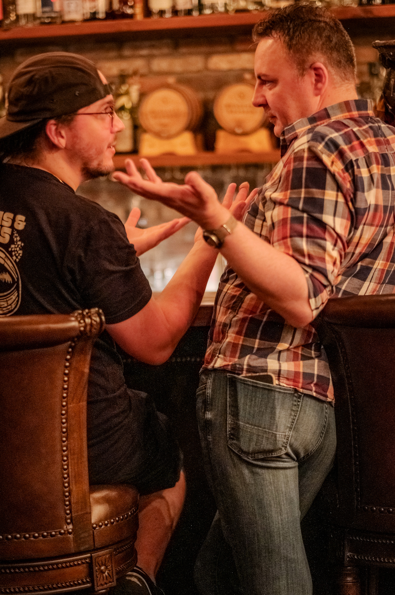 Two distinguished gentlemen having a friendly debate