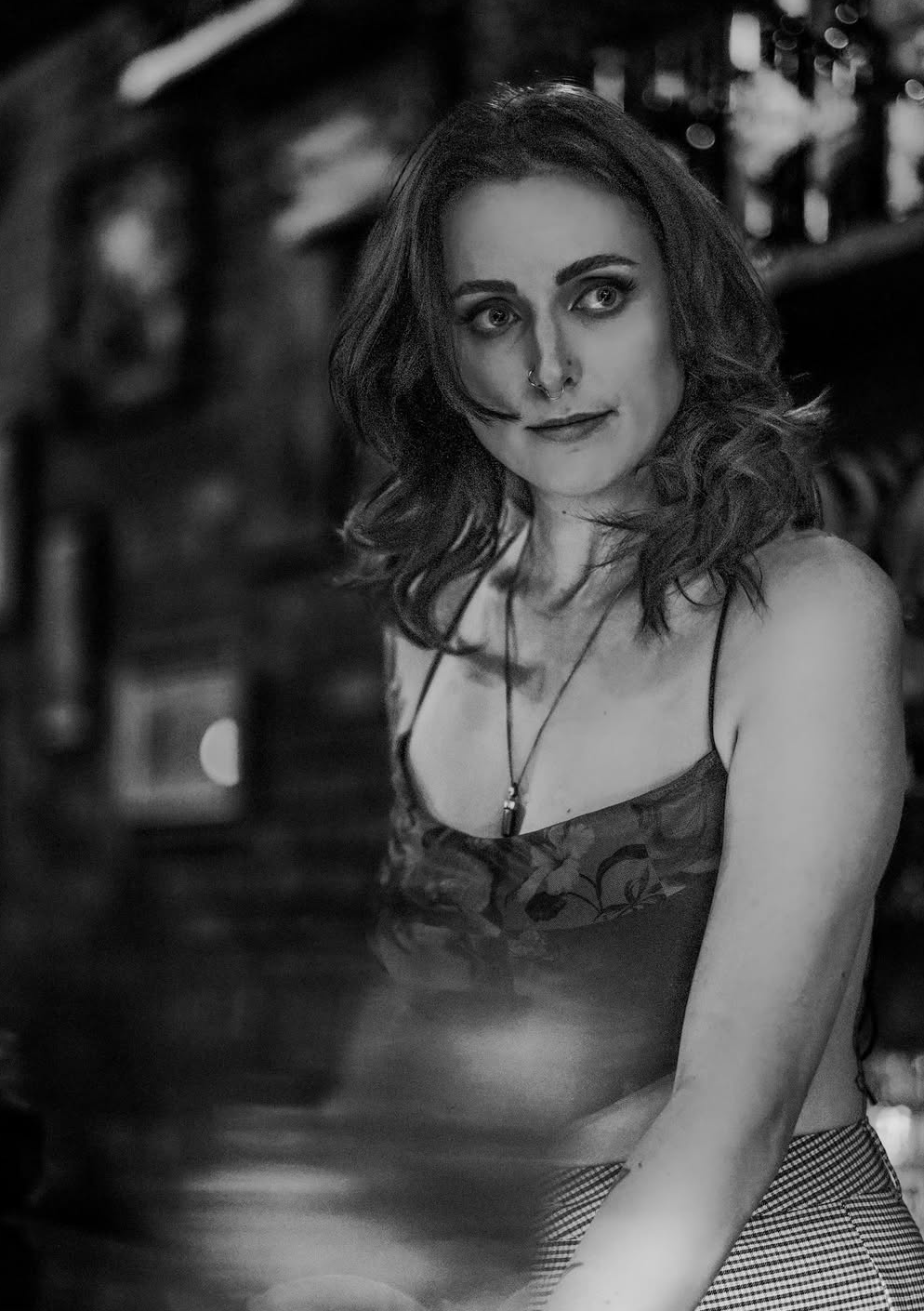 Bartender Chey Triplett standing behind the bar