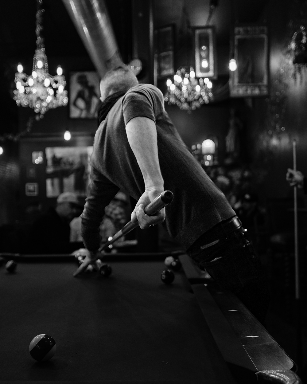 The extra special and extra spicy behind-the-back shot at the pool table