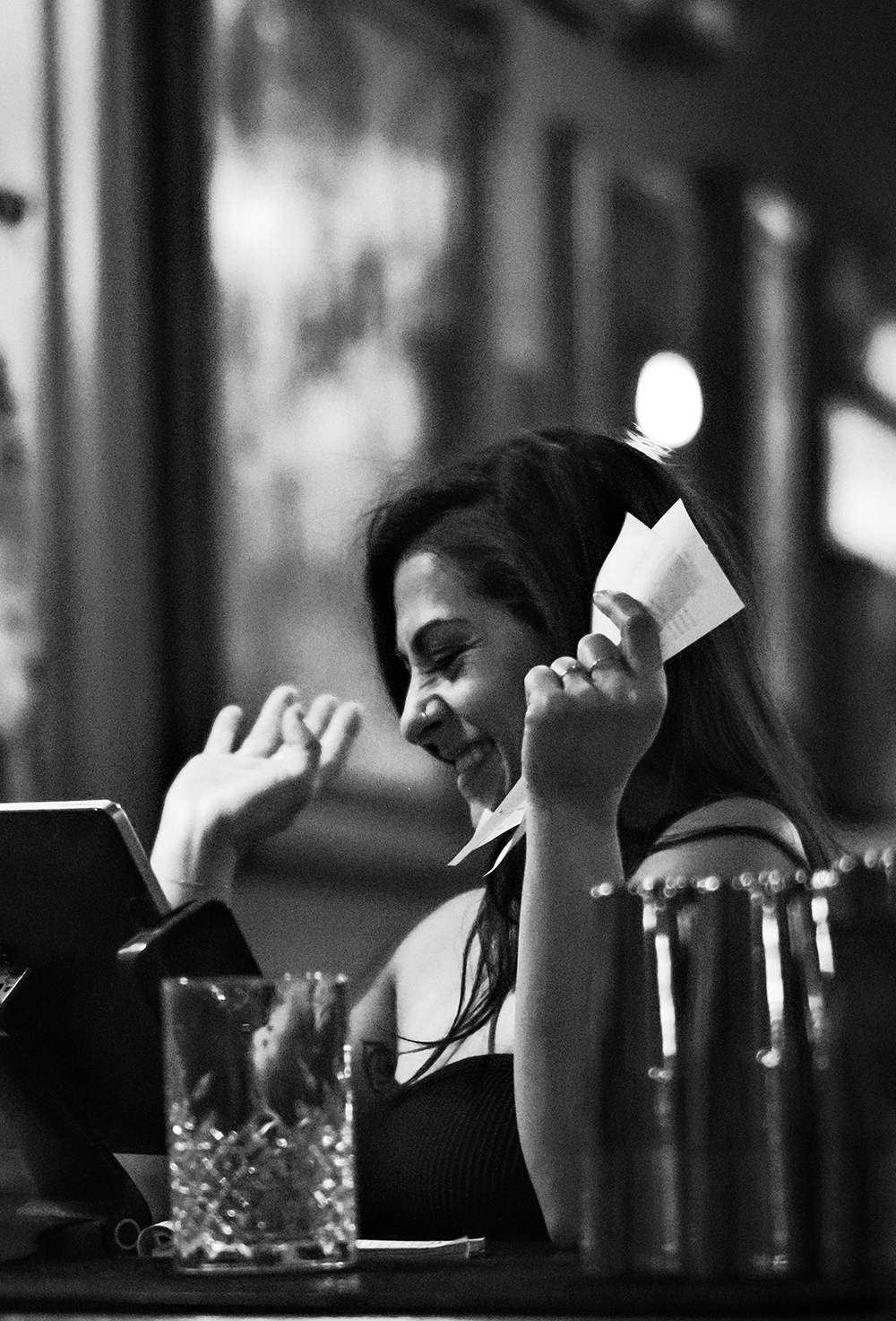 Server Beck smiling and taking an order 