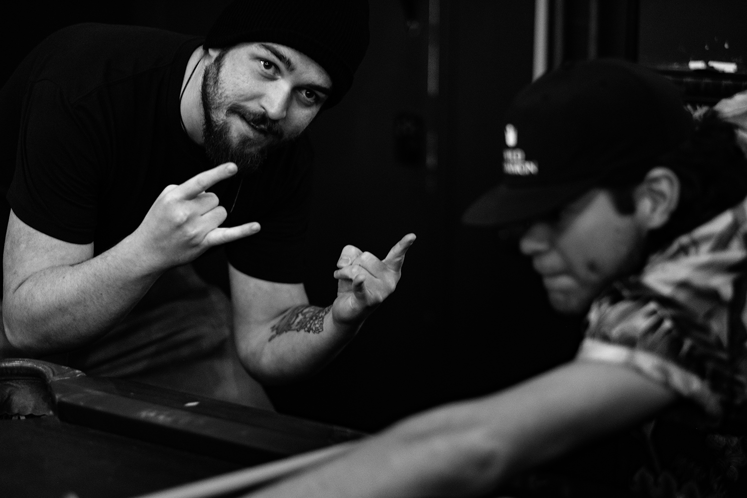 Austin giving the "rock-on" fingers