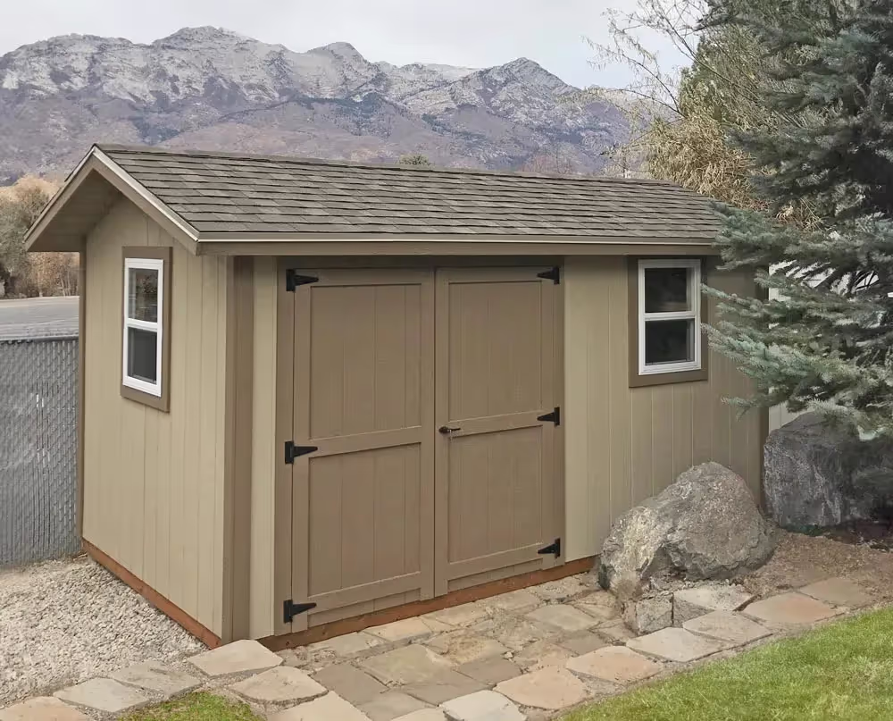 A 10 foot by 14 foot standard apex shed with a 6 foot wide double door and 12 inch roof overhang