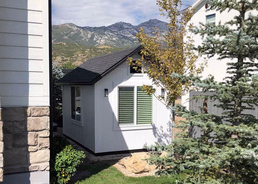 A Standard Apex Shed with a custom 8-12 roof pitch and 12" overhang