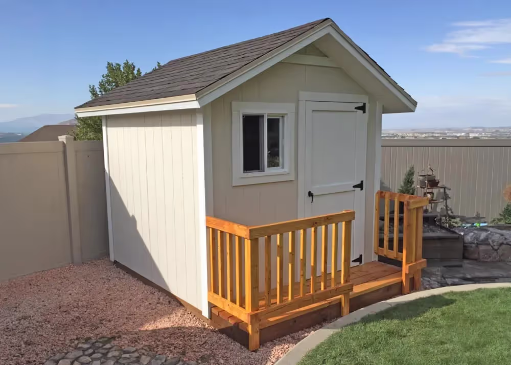 An 8 foot by 8 foot standard apex shed with a porch and a custom roof pitch