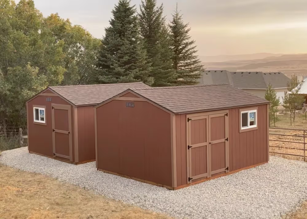 A pair of 12 foot by 16 foot standard apex storage sheds