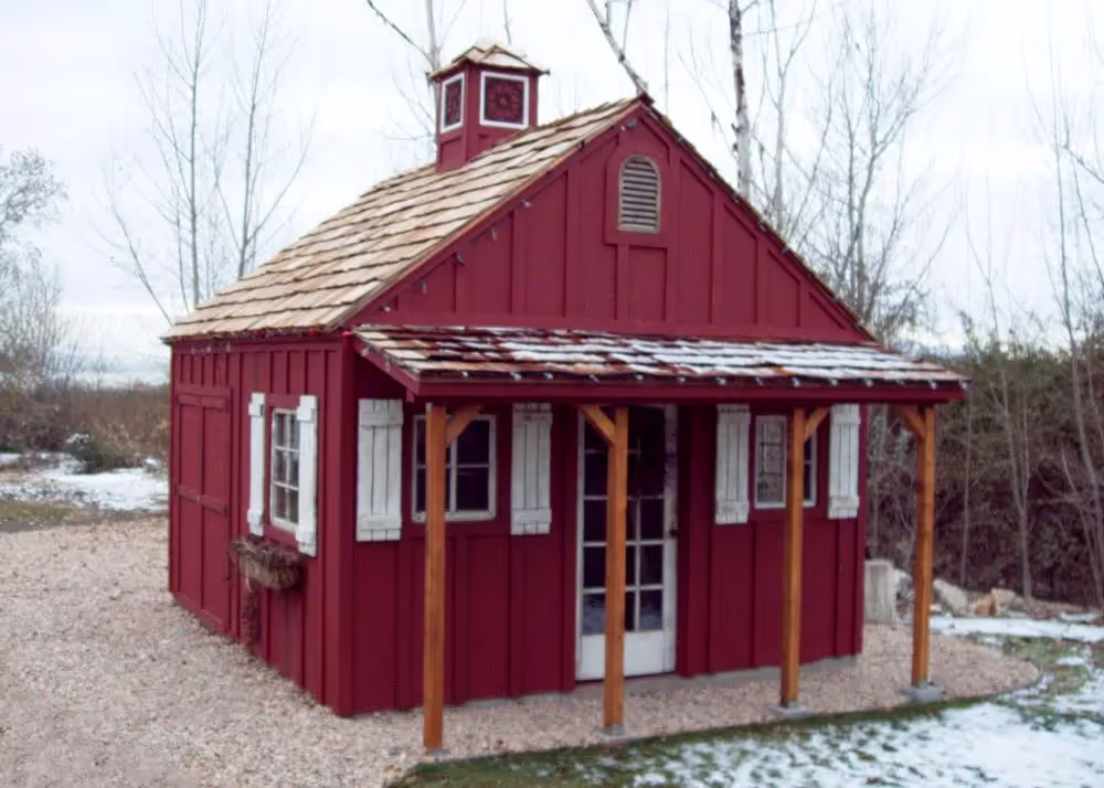 A 14 foot by 16 foo custom tall apex shed with board and batten siding and many other options
