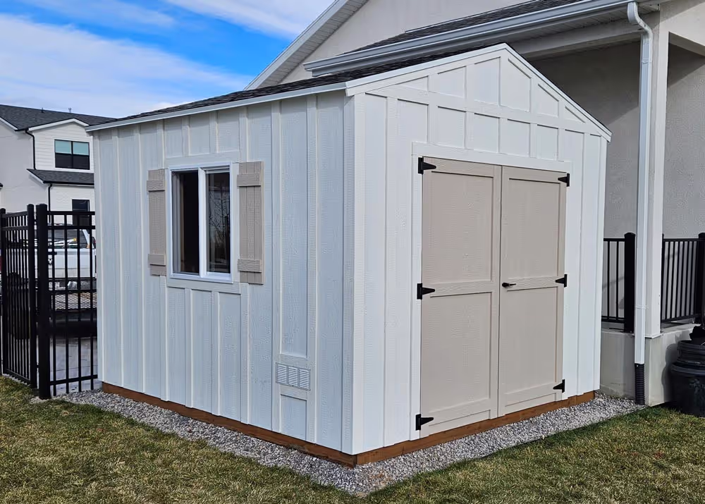 A 10' x 12' Tall Apex storage shed with board and batten siding