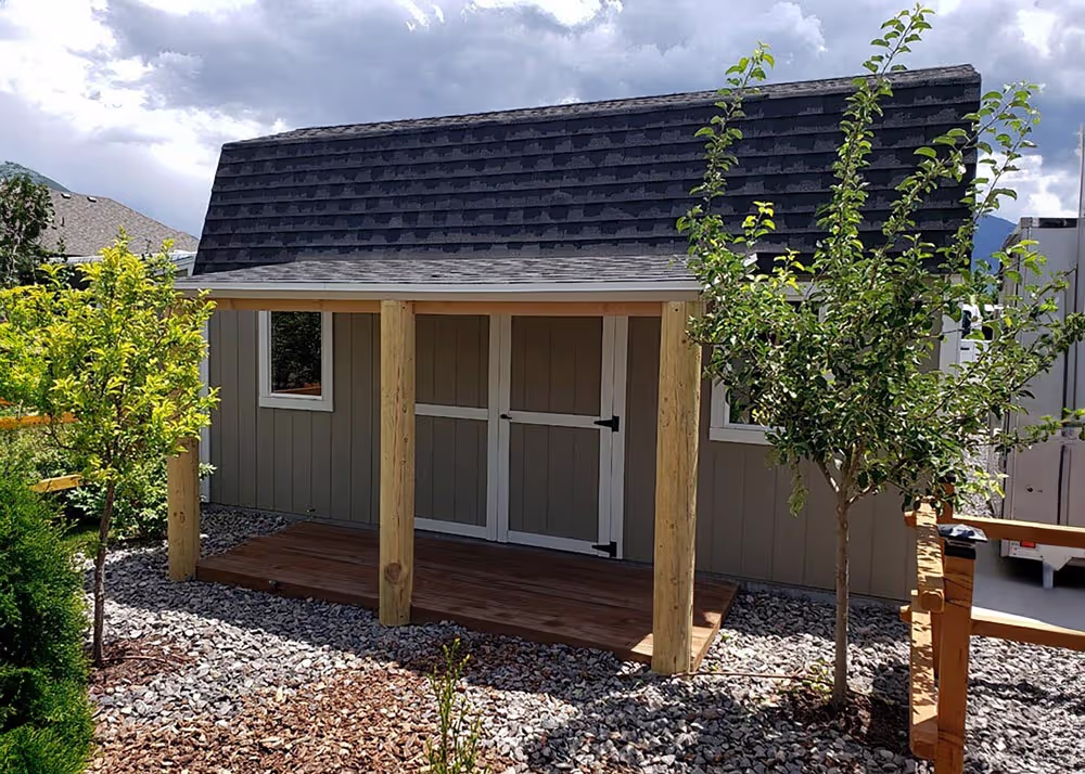 A 10 foot by 20 foot standard barn with a custom porch overhang.