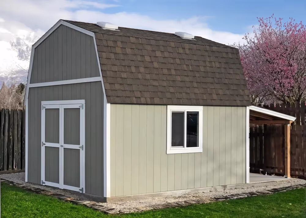 A 12 foot by 14 foot standard barn shed with a porch overhang off the back side