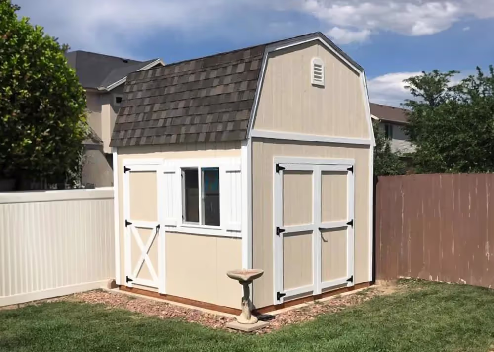 A 10 foot by 10 foot tall barn shed with an extra door and more...