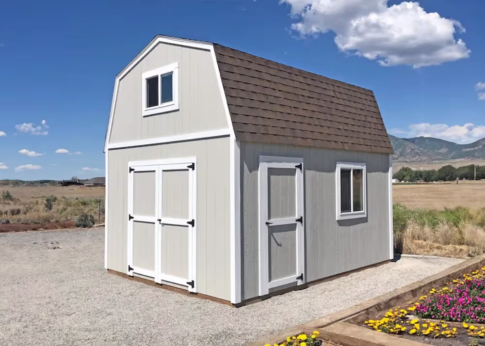 A 12 foot by 16 foot Tall Barn shed with an extra single door and a window in the gable