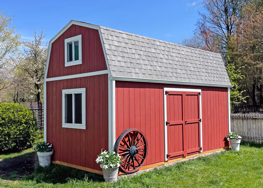 A 10 foot by 20 foot Tall Barn Shed with red and white paint