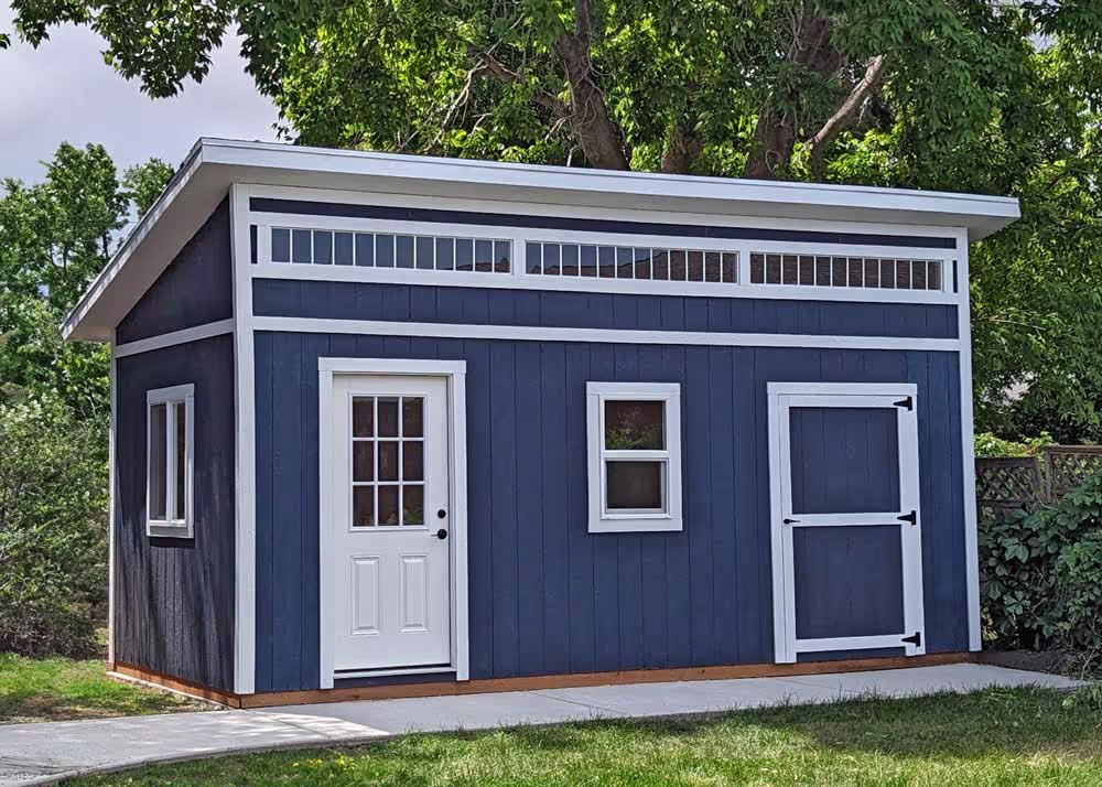A 10 foot by 20 foot Modern Lean-To shed with transom windows in tall wall and more