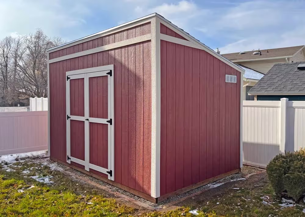 An 8 foot by 14 foot Lean-To style shed with a 6 foot double door on the tall wall