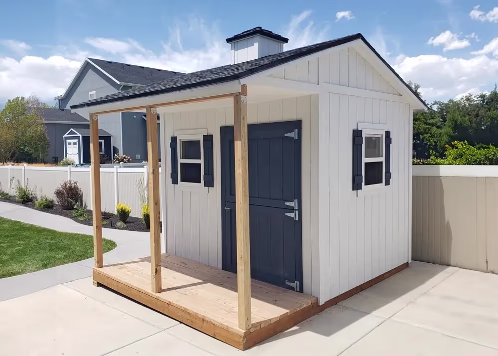 A 12 foot by 10 foot Tall Tack shed with a dutch door and a cupola