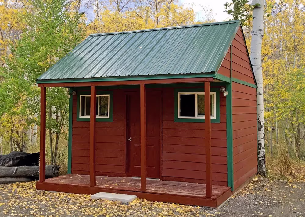 A Custom Tack shed cabin with a custom roof pitch