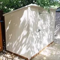 A 4 foot by 8 foot Yard Hutch Mini storage shed