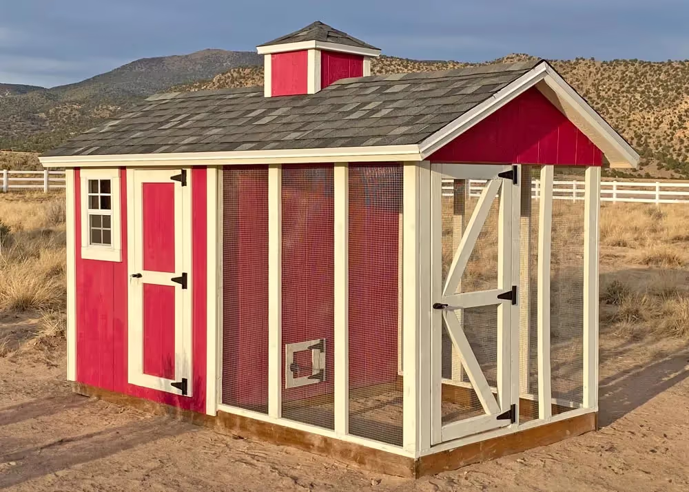 A 6 by 12 coop de'ville chicken coop with cupola in bright red and white