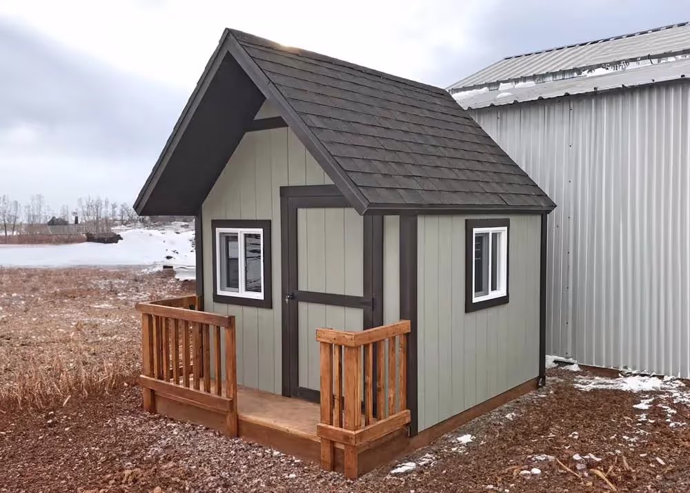 An 8 foot by 10 foot Clubhouse Playhouse with porch railing