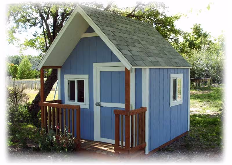 Our standard Clubhouse Playhouse with a porch railing and extra windows