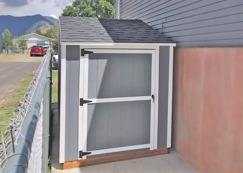 6 by 6 Value Apex shed with a door on the side wall
