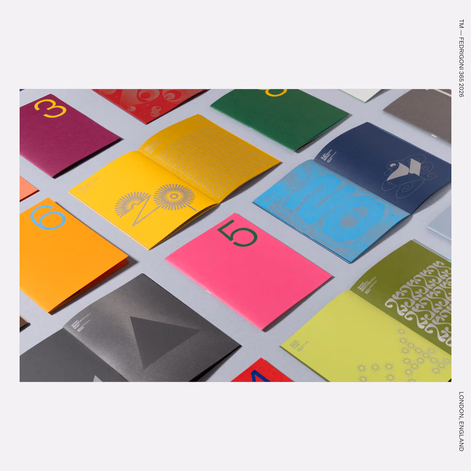 2. Colorful open booklets laid out in a grid, each featuring bold numbers and abstract graphic patterns.