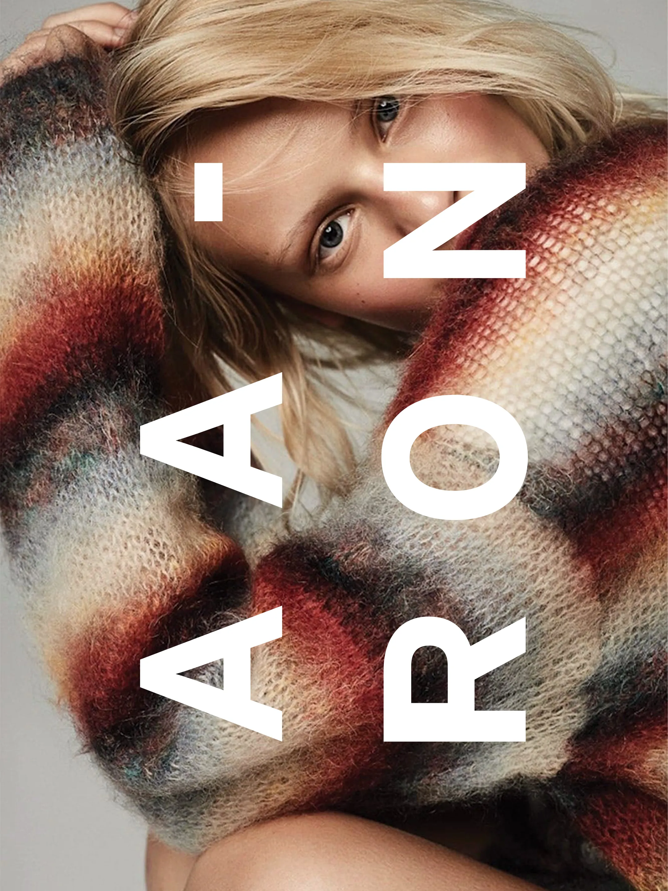 Aaron Smith postcard with oversized white lettering over a model in a striped sweater.