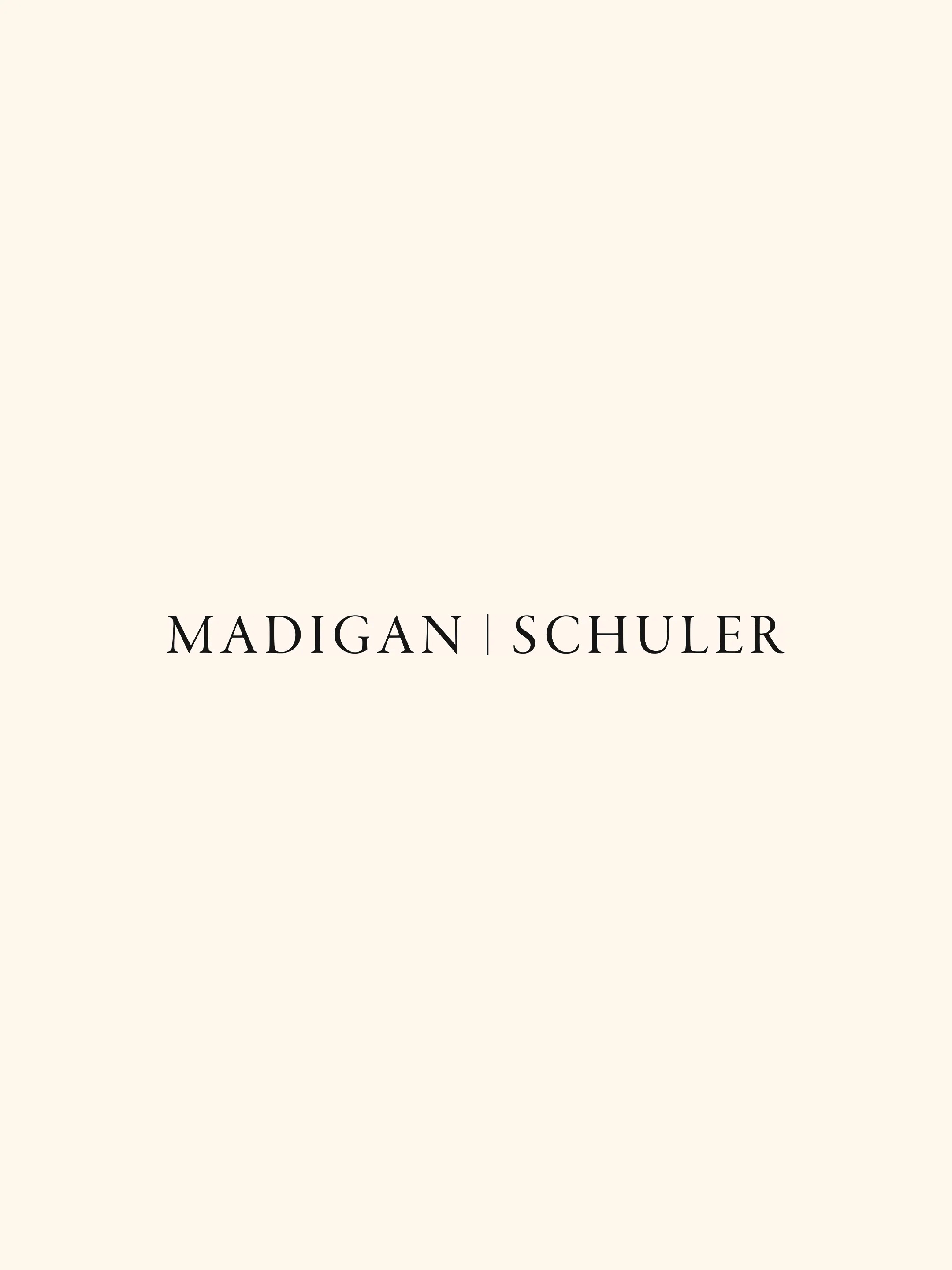Madigan Schuler wordmark in dark serif lettering on an ivory background.