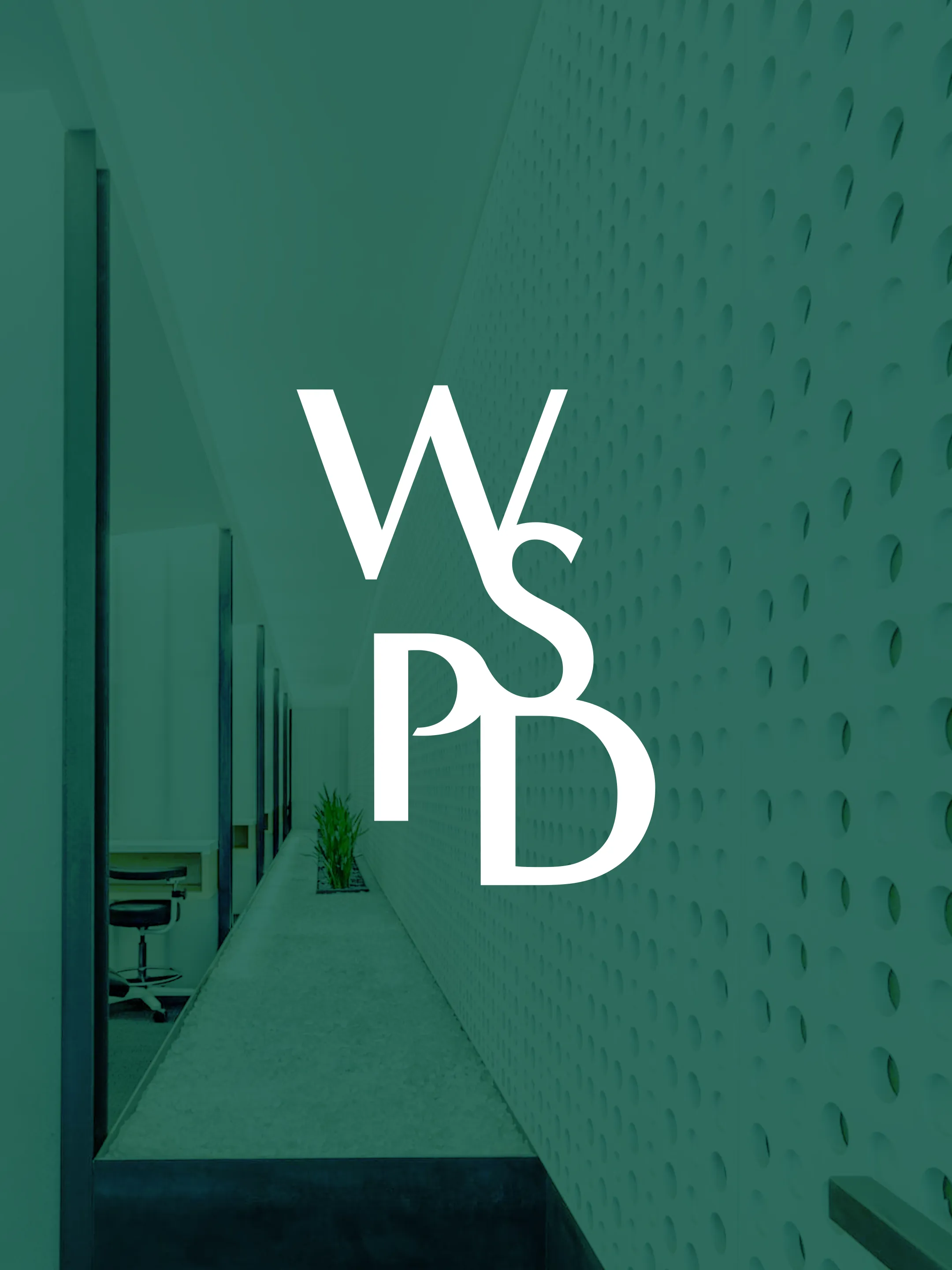 White Washington Square Park Dental monogram over a dark green background.