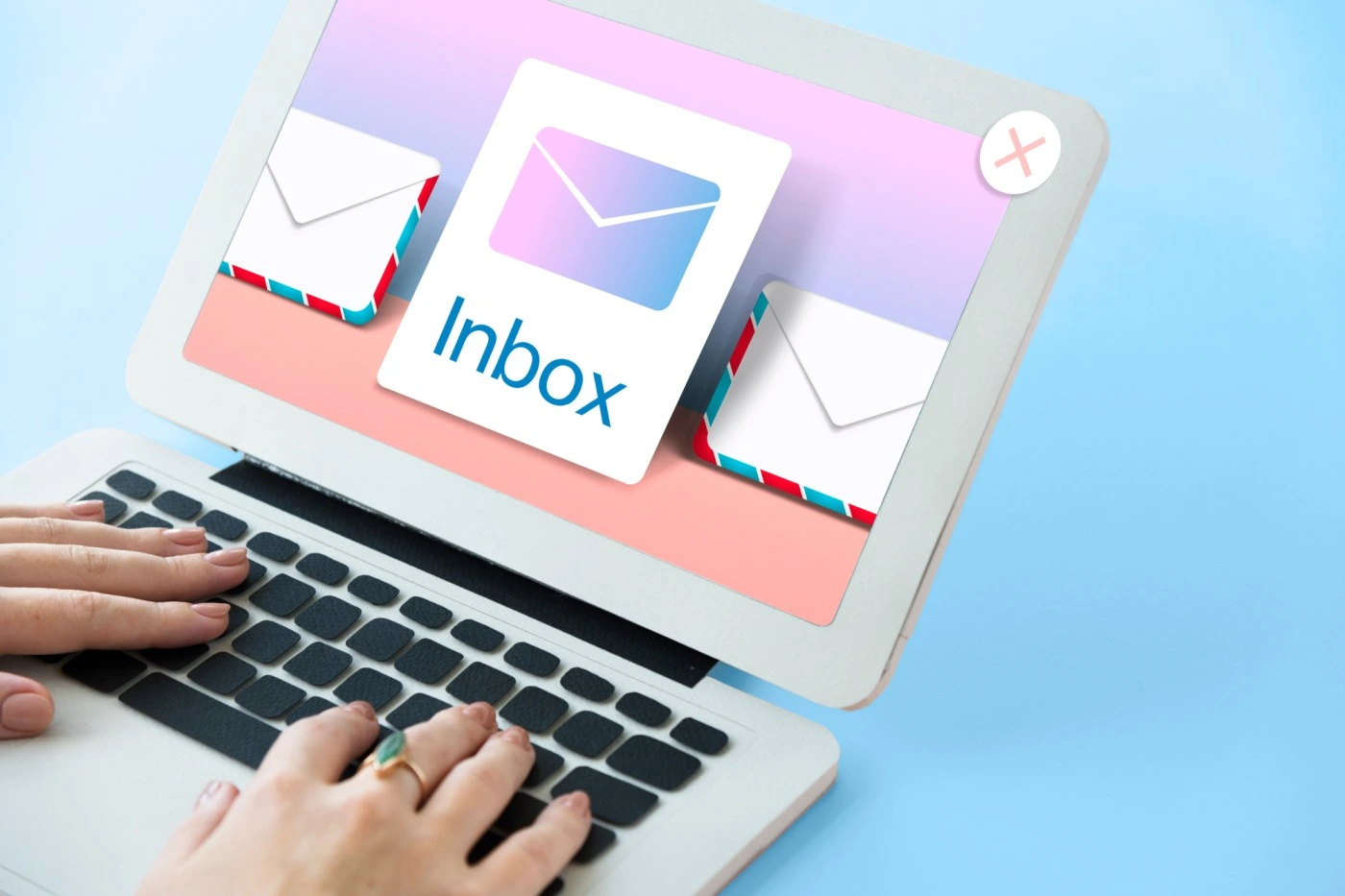Inbox interface on laptop screen representing Outlook email app experience on Mac