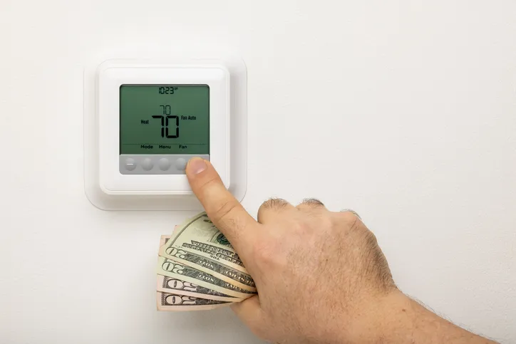 Tips for reducing heating costs, featuring energy-saving strategies and efficient practices.