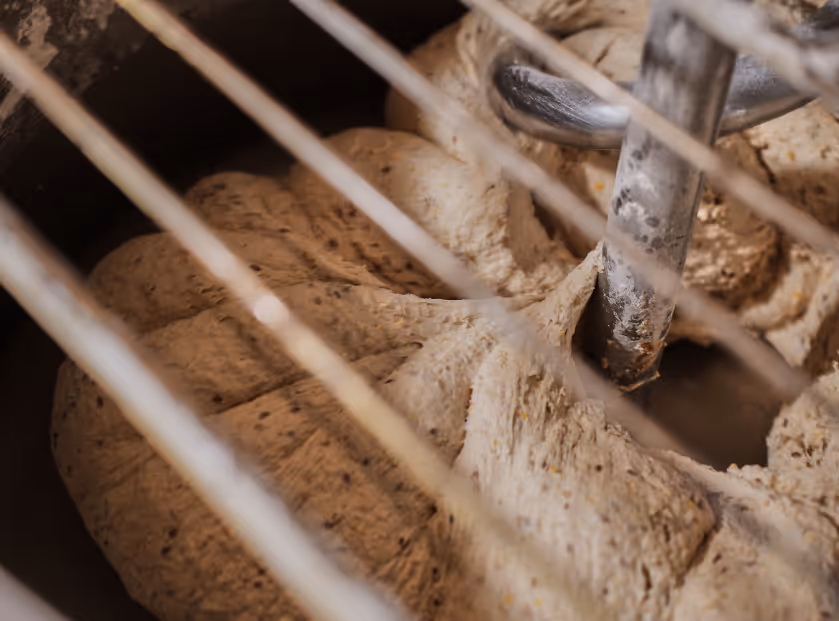 Dough getting mixed in a mixer