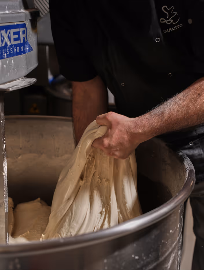 Mixing the dough manually with hands
