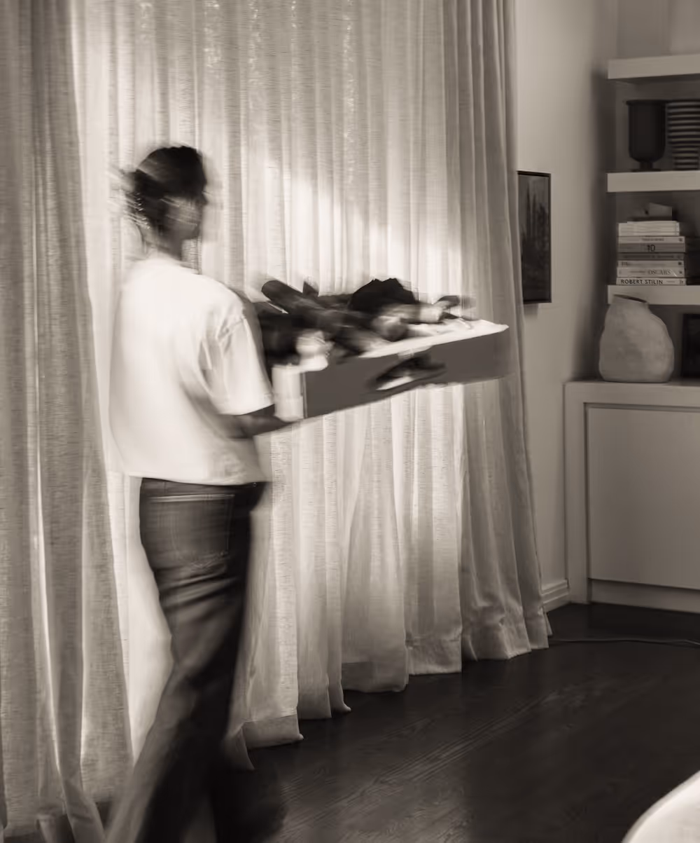 Carrying a tray of bread