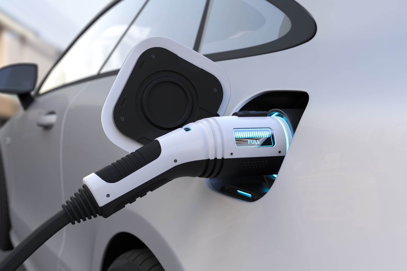 Modern EV charging station connected to white electric car outdoors