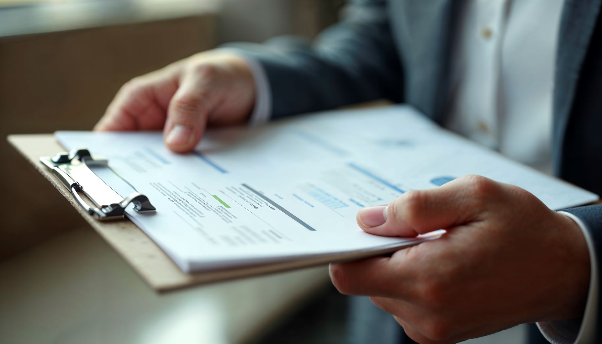 Buyer reviewing essential car purchase documents with dealership representative