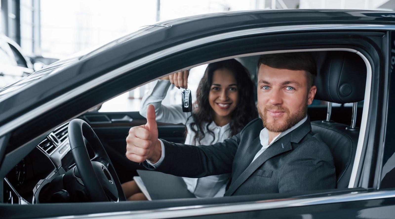 Woman showing thumbs up and down weighing pros and cons of a car down payment