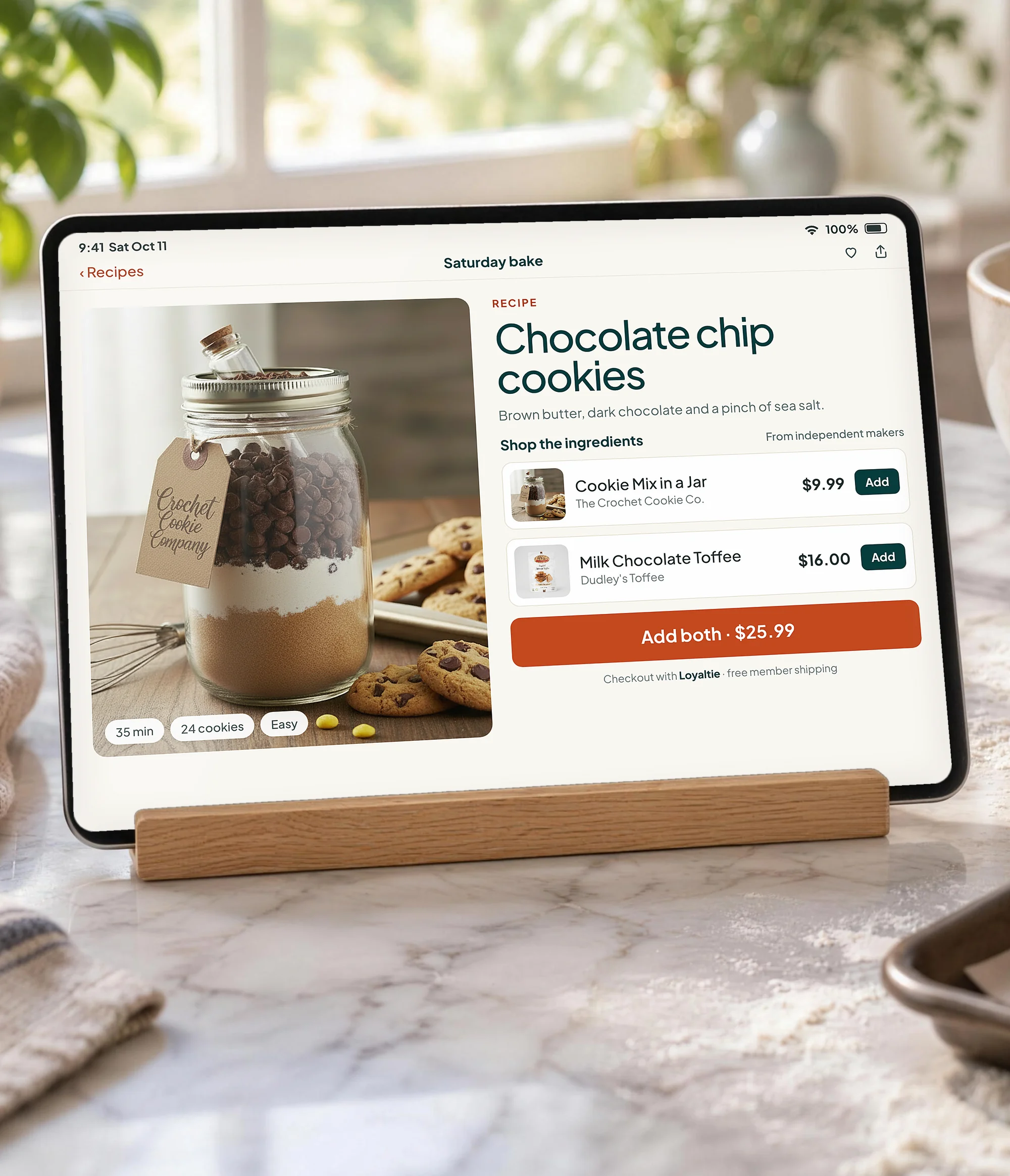 A recipe app on a tablet in a kitchen, showing ingredients to buy