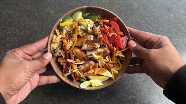 Hands holding a bowl