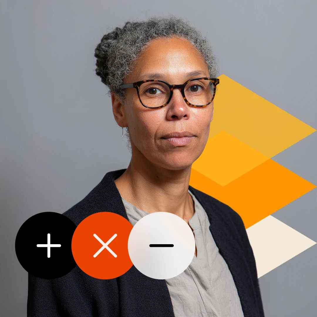 Portrait of a woman with gray curly hair tied back, wearing tortoiseshell glasses and a dark jacket, with abstract orange geometric shapes and math symbols overlay.