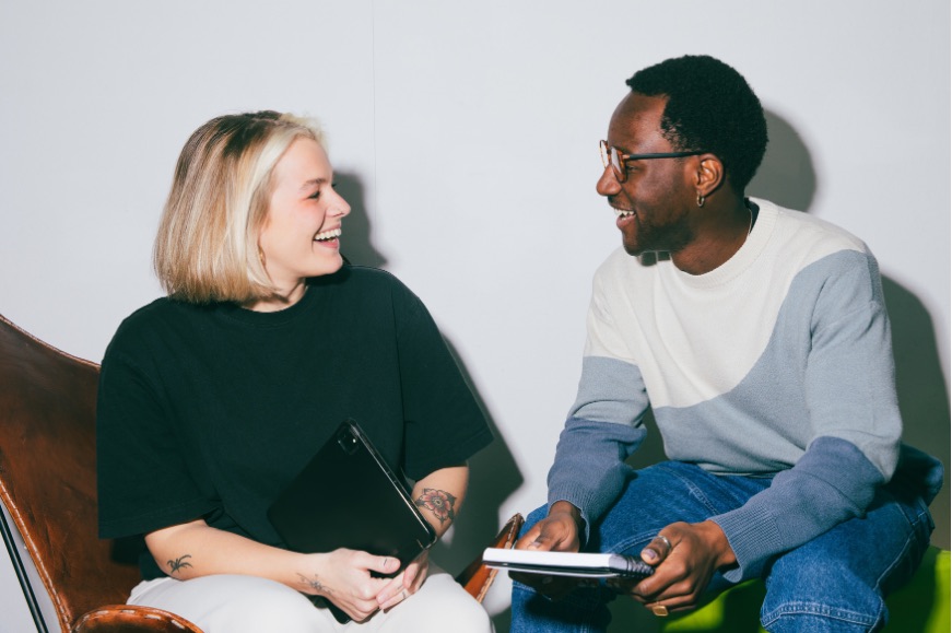 Colleagues laughing together