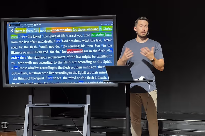 Rob Russell speaking at an event for Restoration Community Church in Mandeville