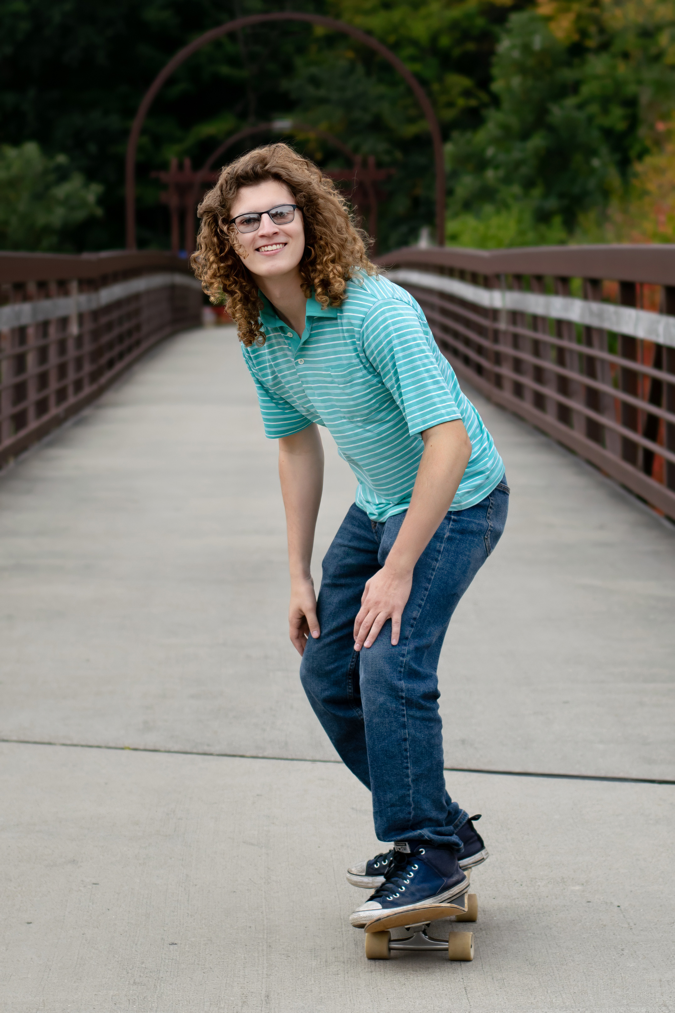 Kayza & Vine Iowa Senior Photographer Alicia Pette 2023 Riding Skateboard in Cedar Rapids, IA
