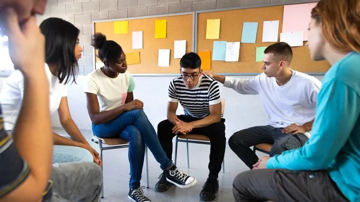 Students discussing mental health in classroom