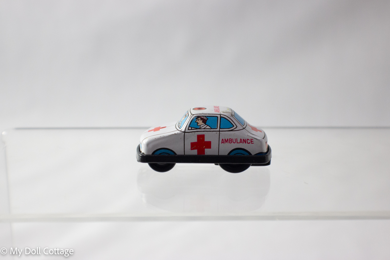 c.1960s  Japanese Litho Tin Ambulance Car with Plastic Base