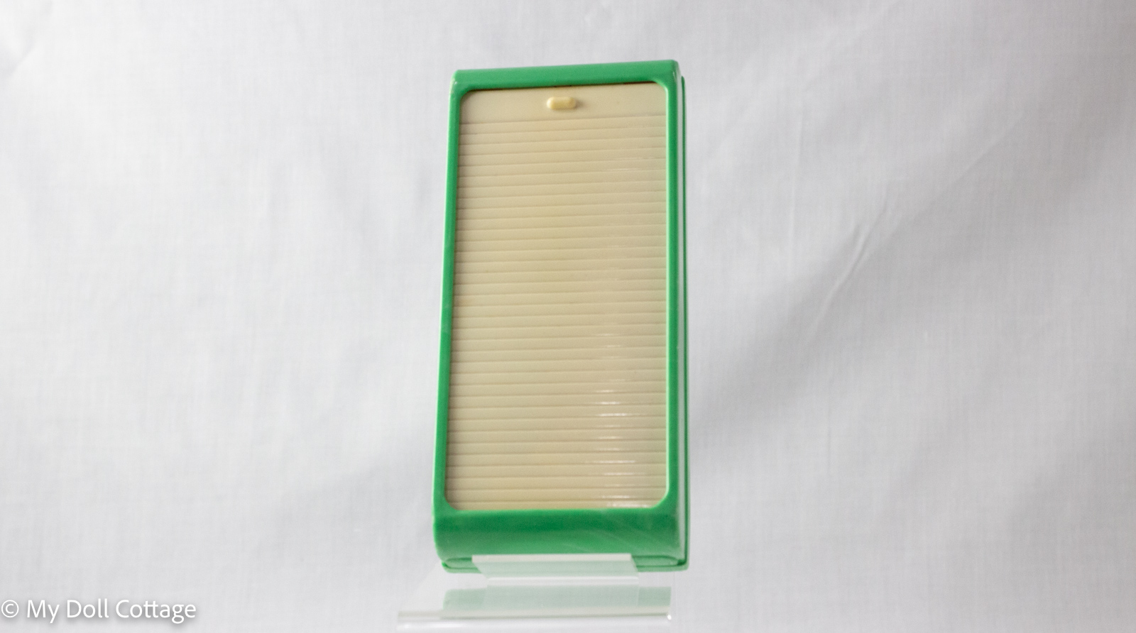 Vintage Rolinx Products green and cream sliding pencil case, closed with cream ridged panel, made in England