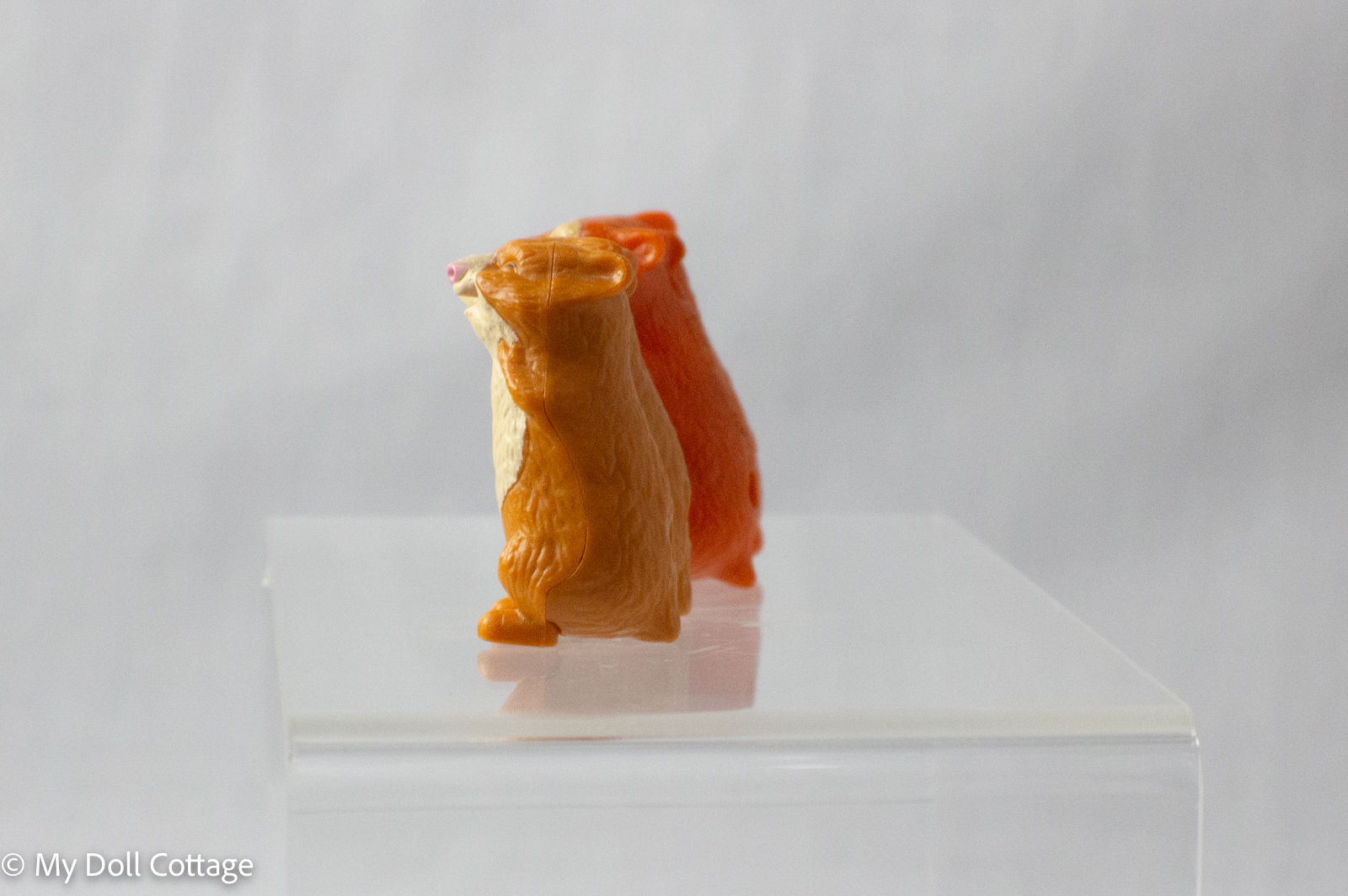 Side view of the wind-up chipmunk toy showing detailed textured fur